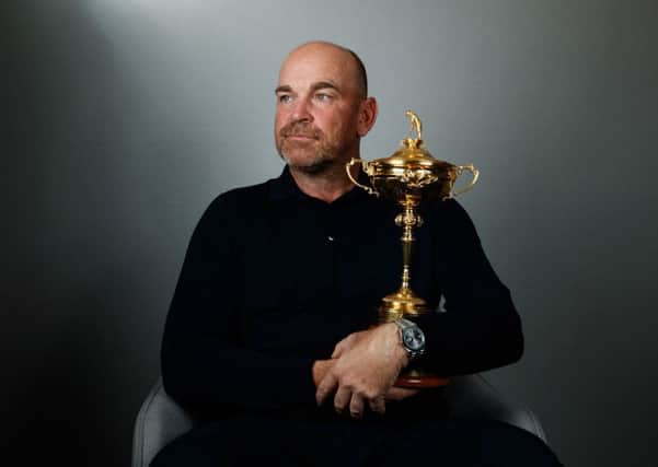 Proud: European Ryder Cup captain Thomas Bjorn with the Ryder Cup.