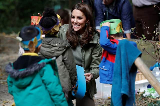 The Duchess of Cambridge talks to children at Sayers Croft Forest School and Wildlife Garden at Paddington Recreation Ground, London.
