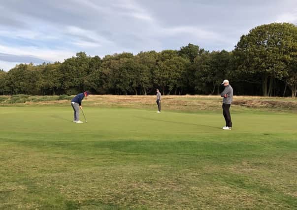 Alwoodley's Will Shucksmith putts on his home course on day one of the North of England championship (Picture: Jack Backhouse).