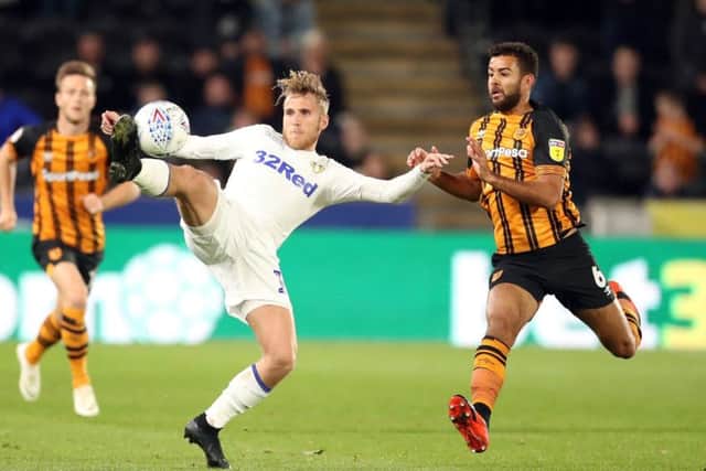 Leeds United moved top with victory at Hull.