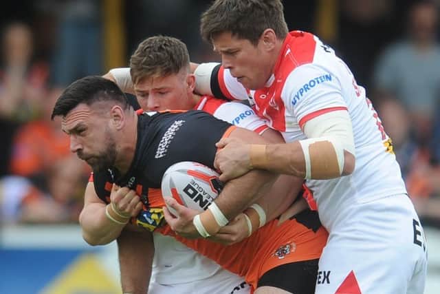 Another chance: Prop Matt Cook, pictured against St Helens, thought his season was over after tearing a biceps. (Picture: Tony Johnson)