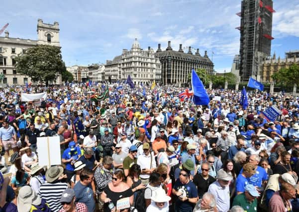 Crowds arrive in Parliament Square in central London, during the People's Vote march for a second EU referendum.