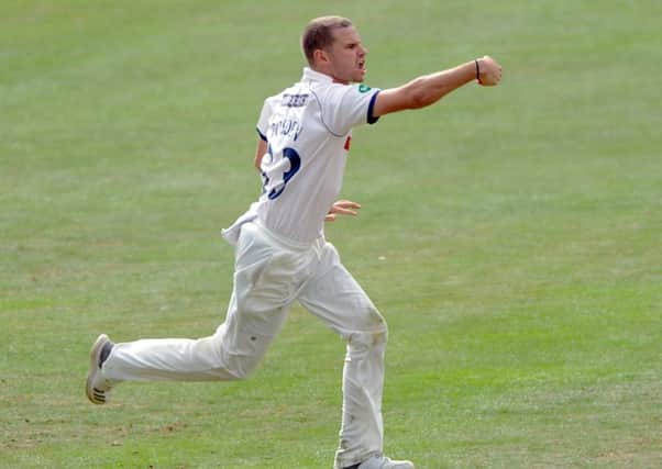 Yorkshire bowler Josh Poysden celebrates his first wicket for the county against Worcestershire (PIcture: Dave Williams)