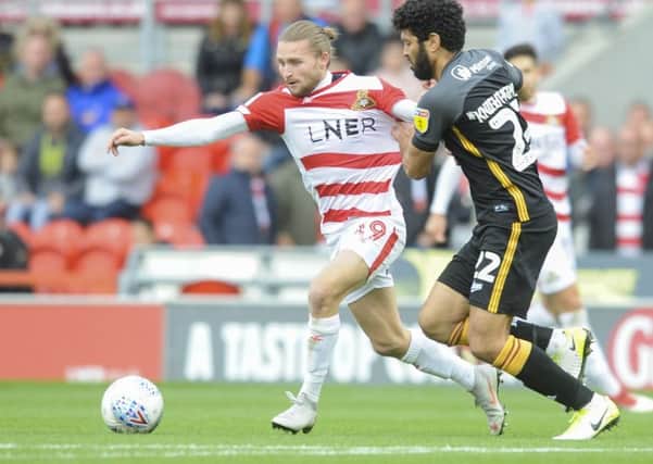 Doncaster's Alfie May: Aiming for starting role.