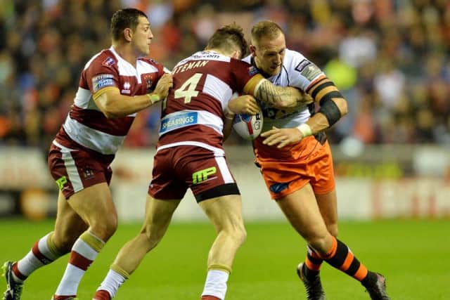 Castleford Tigers' Liam Watts looks for a hole in Wigan's defence. (PIC:BRUCE ROLLINSON)