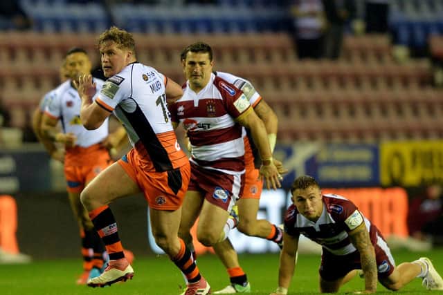 Adam Milner, earning a first England call-up this week, makes a rare break for Castleford Tigers (PIC: BRUCE ROLLINSON)
