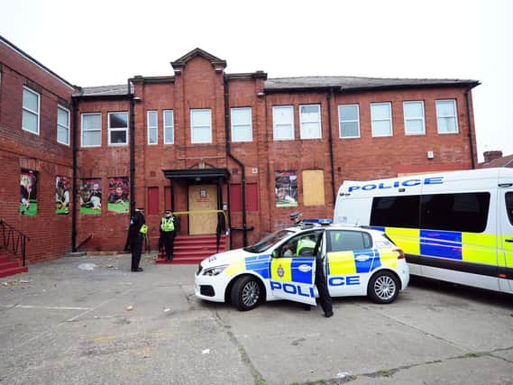 Police raid buildings in Leeds. Photo: Simon Hulme