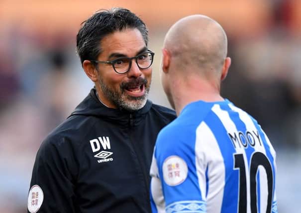 Huddersfield Town manager David Wagner and Aaron Mooy.