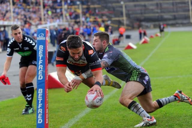 Bradford Bulls winger Jy Hitchcox goes in for one of his three tries against Workington Town
