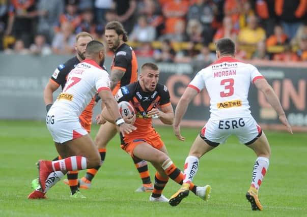 12 May 2018......  Castleford Tigers v St Helens Challenge Cup round 6.
Tigers Greg Minikin looks to go past  Saints  Dominiqie Peyroux and ryan Morgan. Picture Tony Johnson.