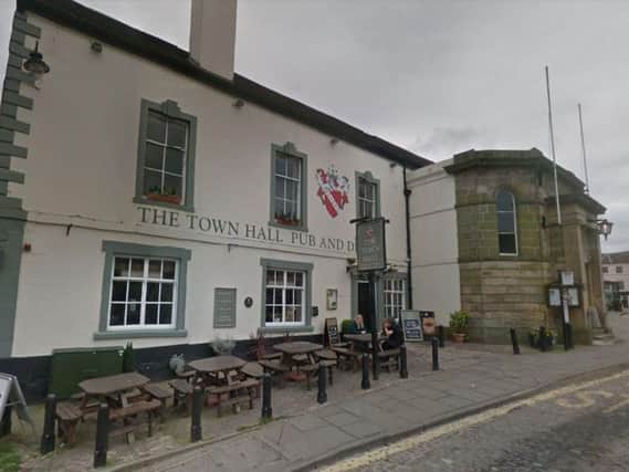 The injured man was found unconscious outside the Town Hall pub in Market Place, Richmond. Picture: Google