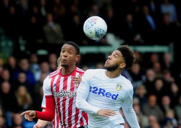 Tyler Roberts is challenged by Ezri Konza during Leeds United's televised draw with Brentford on Saturday (Picture: Simon Hulme)