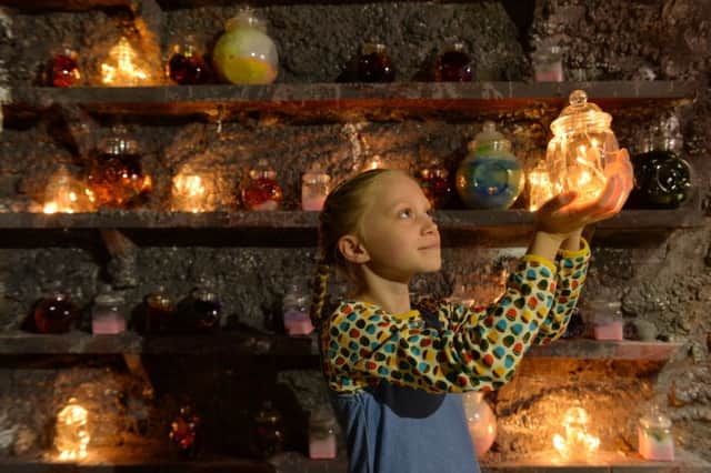Mia Miles, 9, takes on the part of Sophie in the BFG's cave at
York Art Gallery