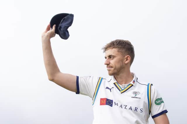 Yorkshire's Ben Coad receives his county cap from prior to the match against Hampshire. He won the Players' Player of the Year award for a second year running. Picture: Allan McKenzie/SWpix.com