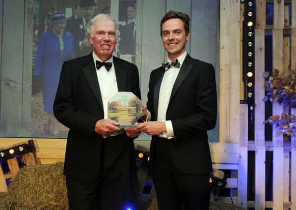 Bill Cowling, left, received a lifetime achieve award at The Yorkshire Post's Rural Awards. It was presented by Tom Watson of Cundalls.