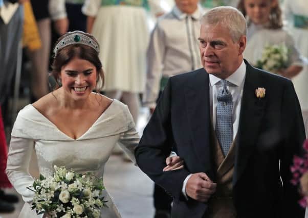 Princess Eugenie walks down the aisle with her father, the Duke of York, for her wedding to Jack Brooksbank. PIC: PA