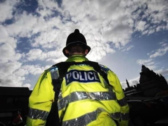 Police dog handler injured as police arrest axeman in Beverley town centre