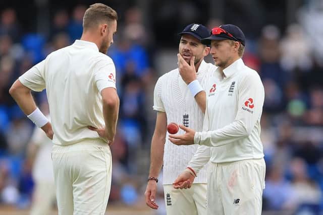 HE'S THE LEADER: England's captain Joe Root (right) talks to Stuart Broad (left) and James Anderson (centre). Picture: Nigel French/PA
