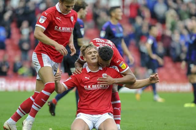Cameron McGeehan celebrates his goal for Barnsley against former club Luton. (Picture: Scott Merrylees)