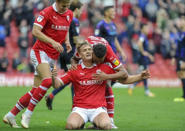 Cameron McGeehan celebrates his goal for Barnsley against former club Luton. (Picture: Scott Merrylees)