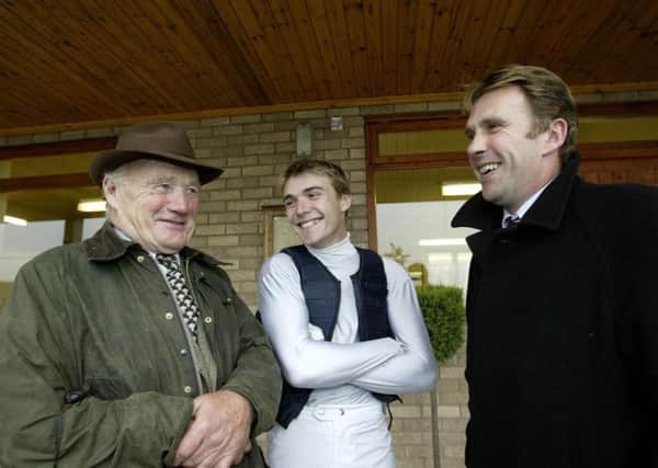 Three generations of the Scudamore family in conversation - Michael, Tom and Peter. Photo:  Andy Watts, Racingfotos.com
