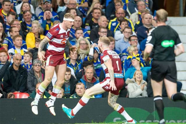 Picture by Allan McKenzie/SWpix.com - 13/10/2018 - Rugby League - Ladbrokes Challenge Cup Final - Wigan Warriors v Warrington Wolves - Old Trafford, Manchester, England - Wigan's Dominic Manfredi celebrates after scoring against Warrington.