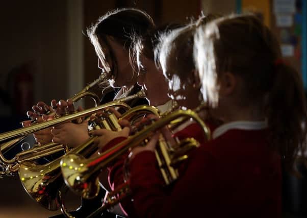 The brass band at Foxhill Primary School where pupils and teachers raise money to pay for music lessons.