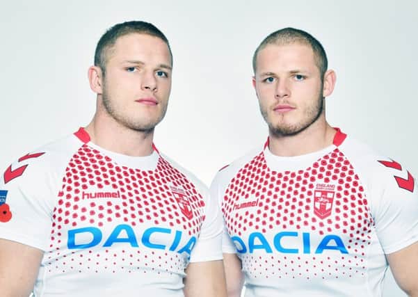 Special edition Remembrance Poppy Shirt that England will wear as a thank you to members of the Northern Union who died in the Great War 1914- 1918. The shirt is modelled by Tom and George Burgess (Picture: Simon Wilkinson/SWPix.com)