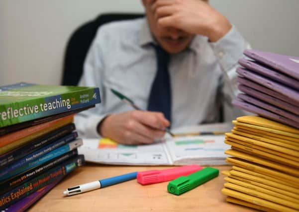 Do teachers spend too much time on paperwork and targets?