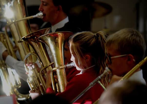 Members of Foxhill Primary School's brass band.