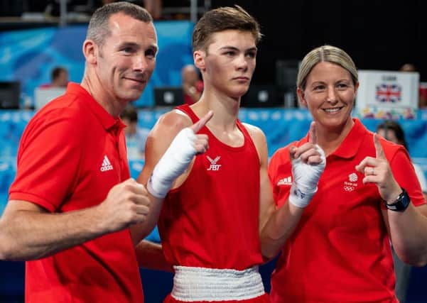 Great Britain's Hope Price after the Gold Medal bout in the Boxing Mens Fly (up to 52kg) with his team at the Oceania Pavilion, Youth Olympic Park. (Picture: Joe Toth/PA Wire)