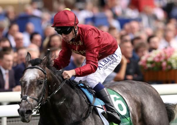 Oisin Murphy and Roaring Lion, pictured winning the Juddmonte International at York.