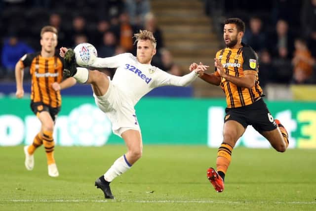 Leeds Uniteds Samuel Saiz, left, stretches to control the ball despite the attentions of Hull Citys Kevin Stewart (Picture: Danny Lawson/PA Wire).