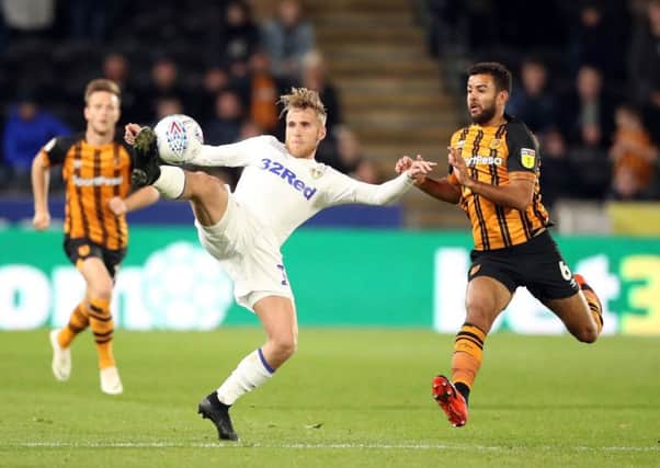Leeds Uniteds Samuel Saiz, left, stretches to control the ball despite the attentions of Hull Citys Kevin Stewart (Picture: Danny Lawson/PA Wire).