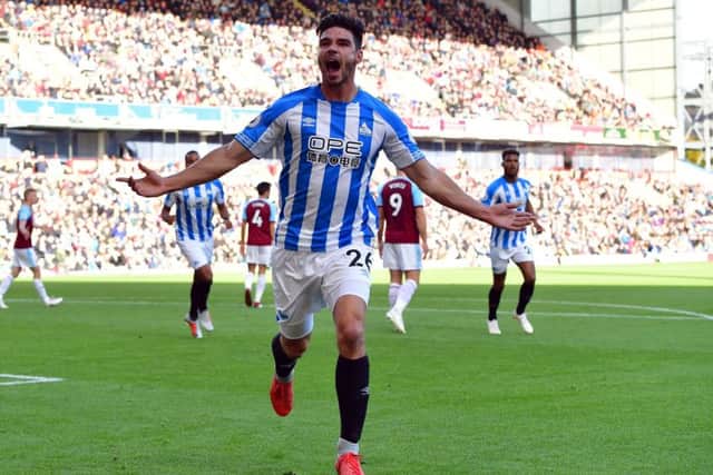 Huddersfield Town's Christopher Schindler celebrates scoring his side's first goal against Burnley (PIcture: PA)