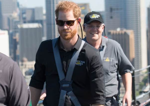 The Duke of Sussex with Australia's Prime Minister Scott Morrison and Invictus Games representatives climb the Sydney Harbour Bridge in Sydney,  on the fourth day of the royal visit to Australia.