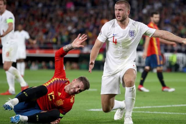 Spain's Sergio Ramos goes down injured as England's Eric Dier protests during the Nations League match at Benito Villamarin Stadium, Seville. (Picture: Nick Potts/PA Wire)