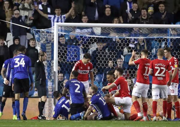 Sheffield Wednesday and Middlesbrough players disentangle themselves following a goalmouth melee as the hosts sought a late equaliser at Hillsborough (Picture: Tim Goode/PA Wire).