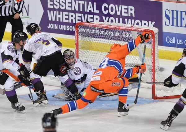 STRIKE ONE: Jordan Owens pounces on a rebound to put Sheffield Steelers 1-0 up against Manchester after just 17 seconds. Picture: Dean Woolley.