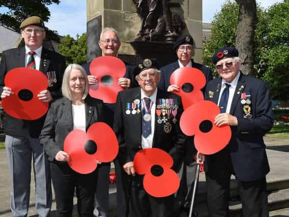 Veterans with poppies at Bridlington War Memorial to kick off the Free Press' Turn The Town Red campaign.