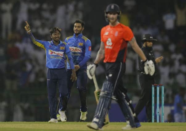 Sri Lanka's Akila Dananjaya celebrates the dismissal of England's Ben Stokes during their fifth one-day international cricket match in Colombo. (AP Photo/Eranga Jayawardena)
