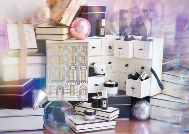 Jo Malone London Advent Calendar: With 25 gorgeous Jo Malone gifts comprising: Orange Bitters Cologne 9ml; Oud & Bergamot Cologne Intense 9ml; Basil & Neroli Body & Hand Wash 15ml; English Pear & Freesia Cologne 9ml;Tuberose Angelica Cologne Intense 9ml; Frosted Cherry & Clove Mini Candle 35g; Earl Grey & Cucumber Cologne 9ml; Wild Bluebell Body Creme 15ml; Wood Sage Sea Salt Cologne 9ml; Dark Amber & Ginger Lily Cologne Intense 9ml; Amber & Lavender Bath Oil 15ml; Peony & Blush Suede Body Creme 50ml; English Oak & Redcurrant Cologne 9ml; Jasmine Sambac & Marigold Cologne Intense 9ml; Lime Basil & Mandarin Cologne 9ml; Incense & Embers Mini Candle 35g; Nectarine Blossom & Honey Cologne 9ml; Tuberose Angelica Body Creme 15ml; Grapefruit Cologne 9ml; Blackberry & Bay Bath Oil 15ml 
Black Cedar Wood & Juniper Cologne 9ml; Orange Blossom Body and Handwash 15ml; Myrrh Cologne Intense 9ml; Pomegranate Noir Mini Candle 35g; Plus another special surprise on the 24th. It's Â£300, online now, in store November 1.