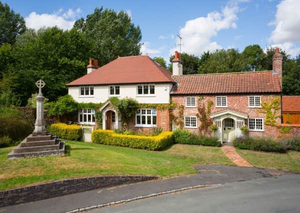 Oak House is in the pretty Wolds village of Kirkburn and comes with a main home plus two holiday lets