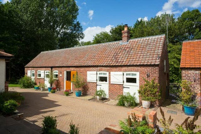 The converted stable block provides more holiday accommodation