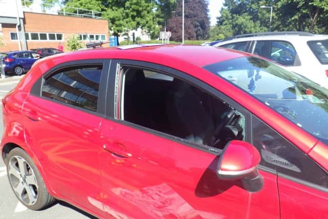 The dogs were found in this red Kia hatchback