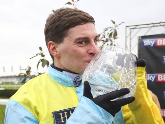 Henry Brooke with the Sky Bet Chase trophy at Doncaster after Wakanda's win in January,