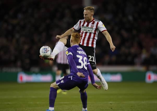 Mark Duffy: In action against Stoke, says Blades are on the up.