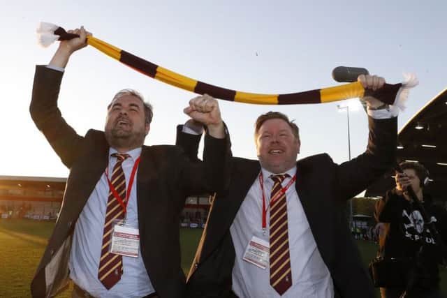 Bradford co-owners Edin Rahic (left) and Stefan Rupp celebrate after the final whistle during the Sky Bet League One playoff semi-final, second leg match at Fleetwood. Picture: Martin Rickett/PA