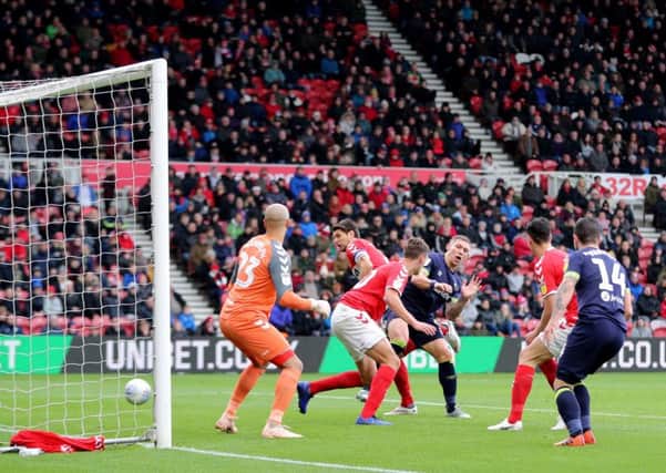 Middlesbrough's George Friend (second left) scores an own goal.