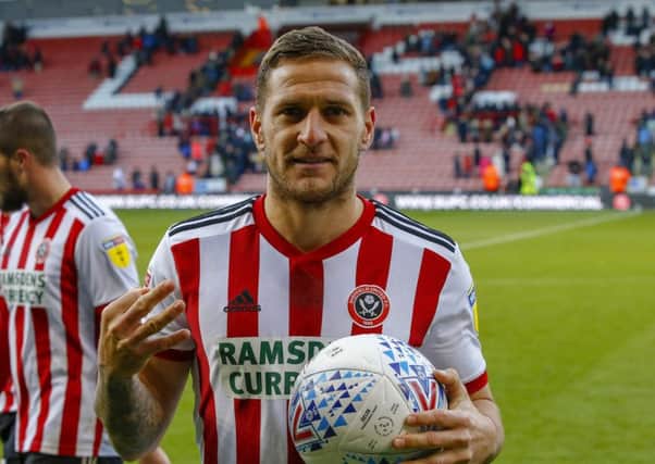 Sheffield United's Billy Sharp with the match ball after scoring a hat-trick against Wigan (Picture: Simon Bellis/Sportimage).
